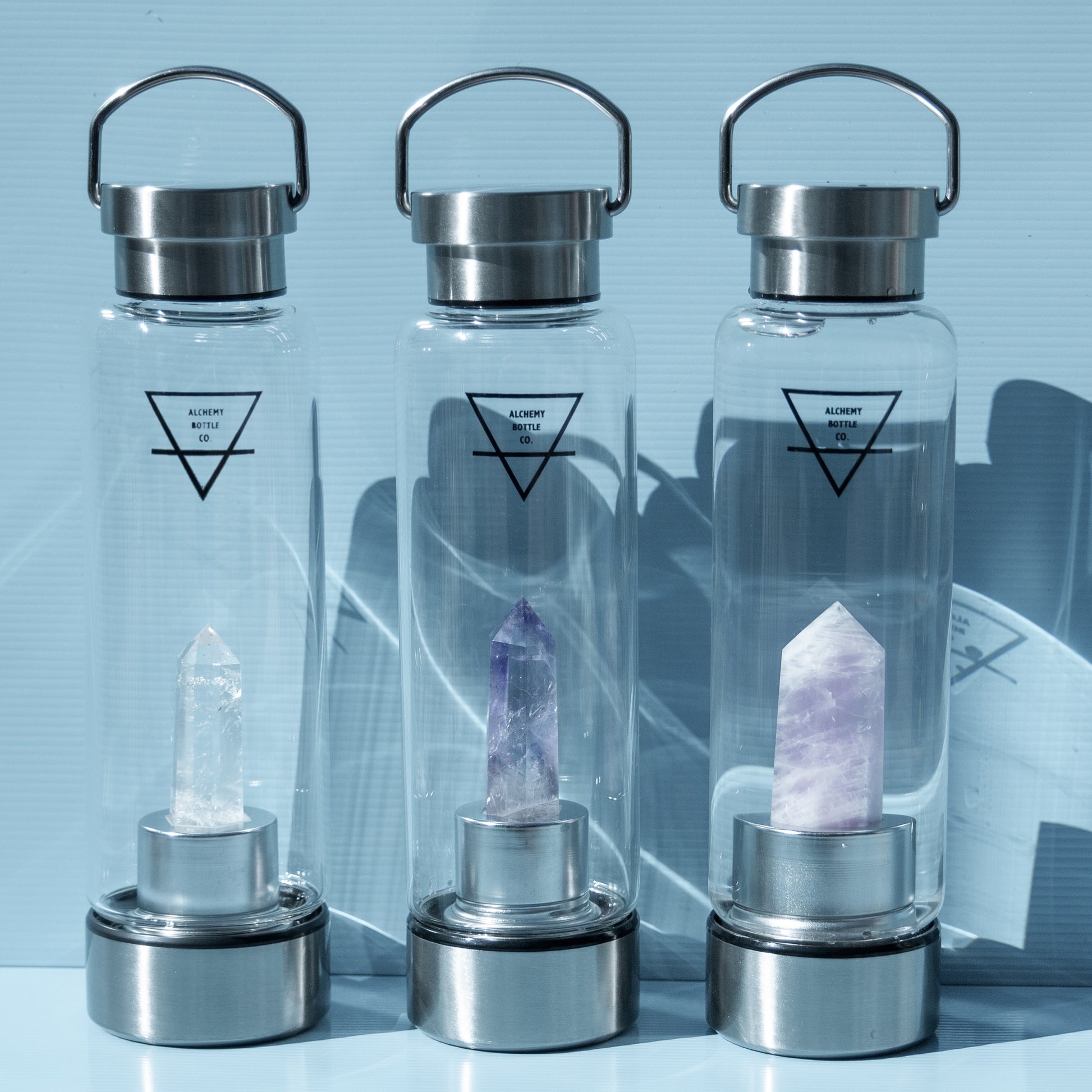 CLEAR QUARTZ, AMETHYST & ROSEQUARTZ CRYSTAL WATER BOTTLE. CRYSTAL HEALING SIP WITH INTITION