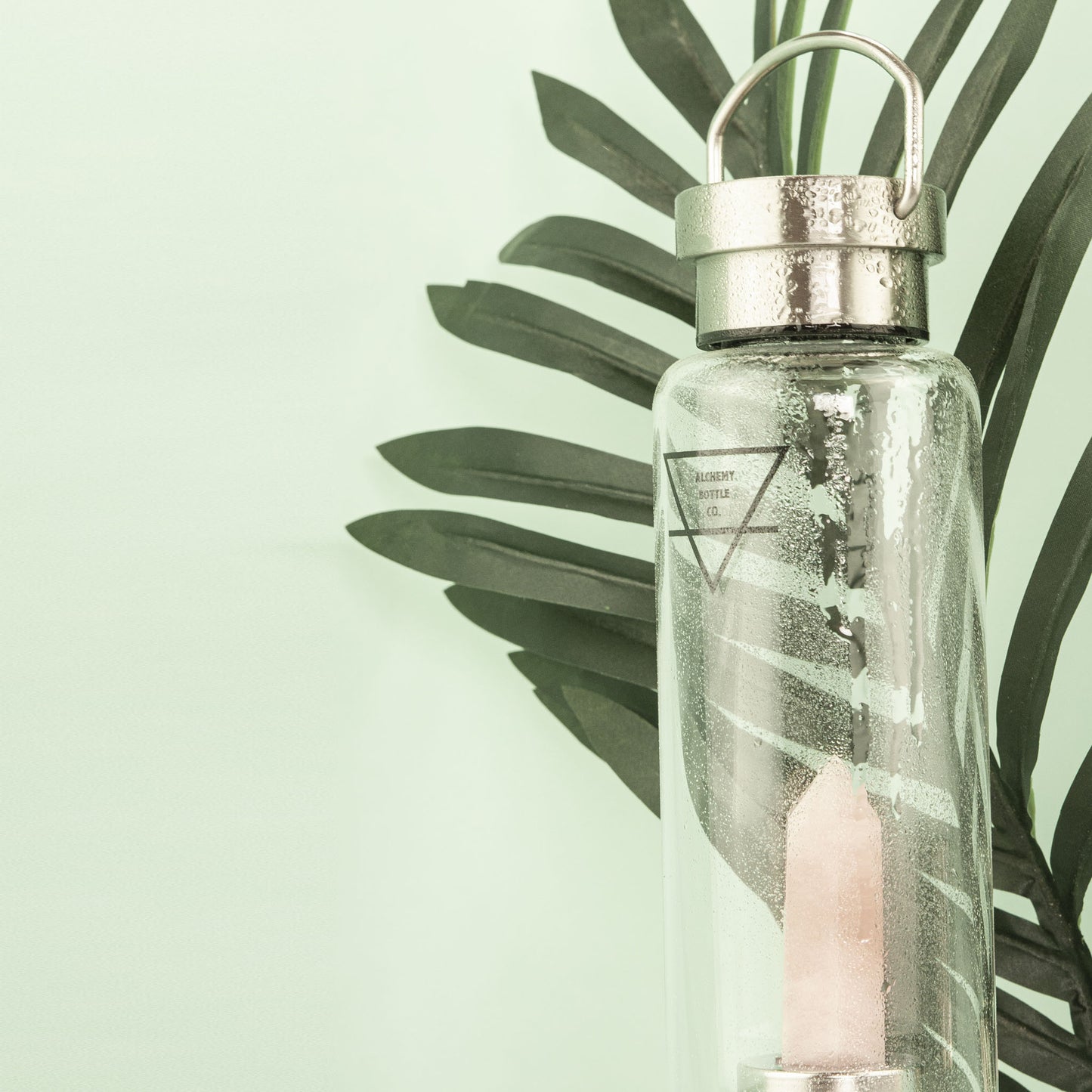 Rose quartz crystal water bottle Australia — love stone self-love healing crystal glass bottle by Alchemy Crystal Co