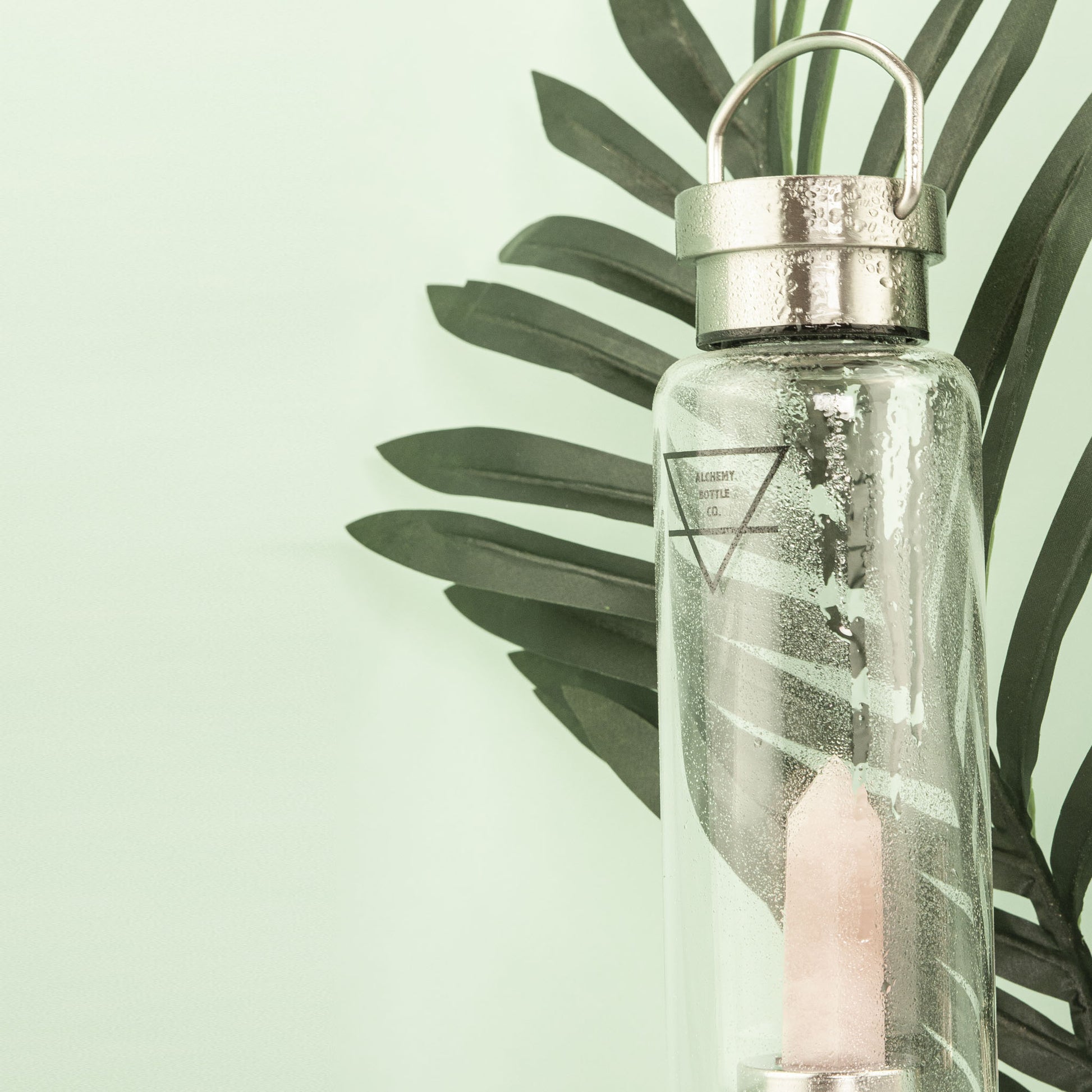 Rose quartz crystal water bottle Australia — love stone self-love healing crystal glass bottle by Alchemy Crystal Co