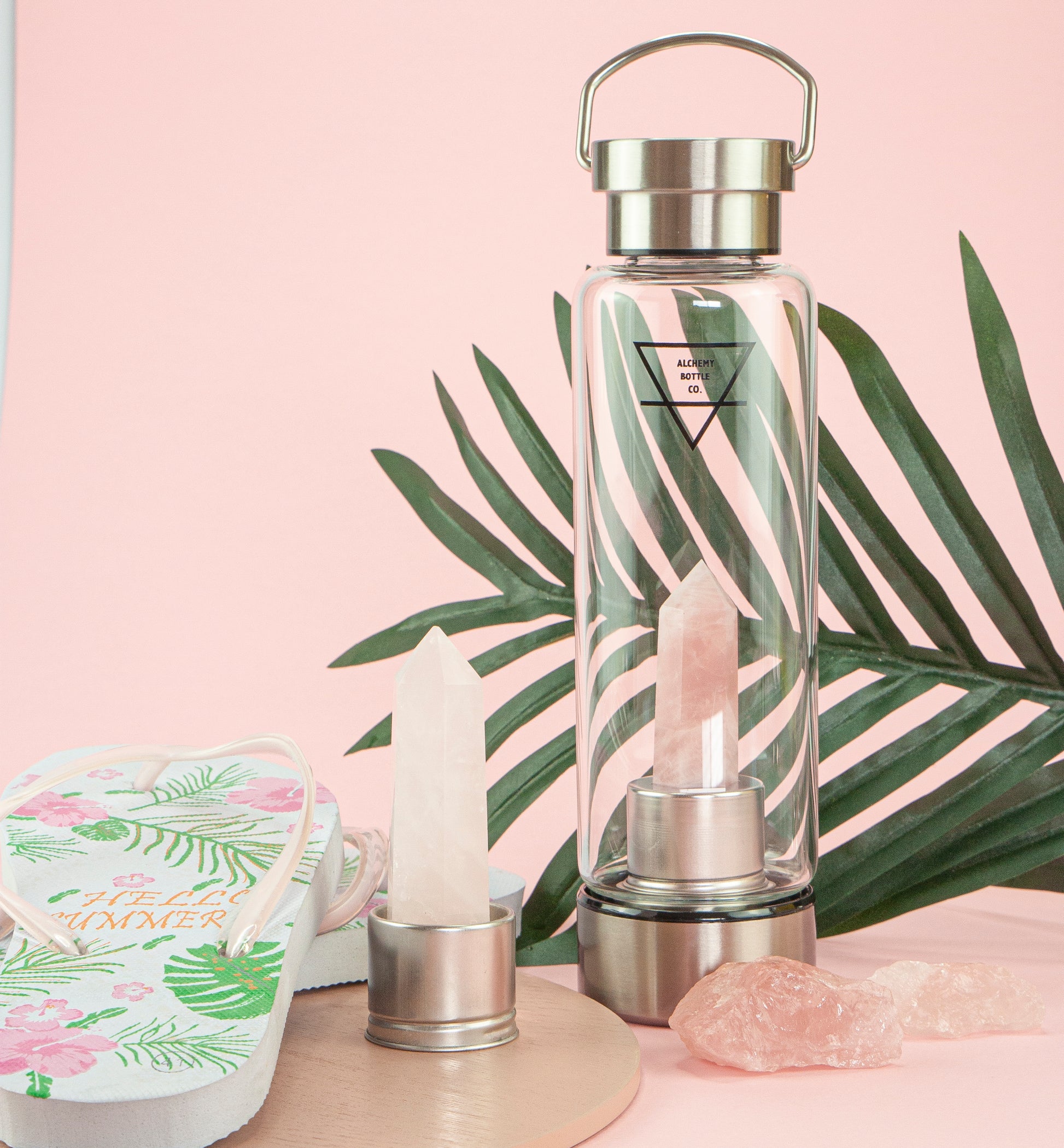 Genuine rose quartz crystal inside glass water bottle — real love stone healing gemstone infused water bottle Australia